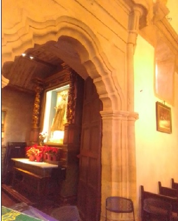 Our Lady statue in a niche